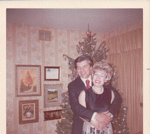 mom-and-dad-in-front-of-christmas-tree-1960s